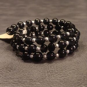 Beautiful Black Beaded Memory Wire Bracelet With Silver Spacers
